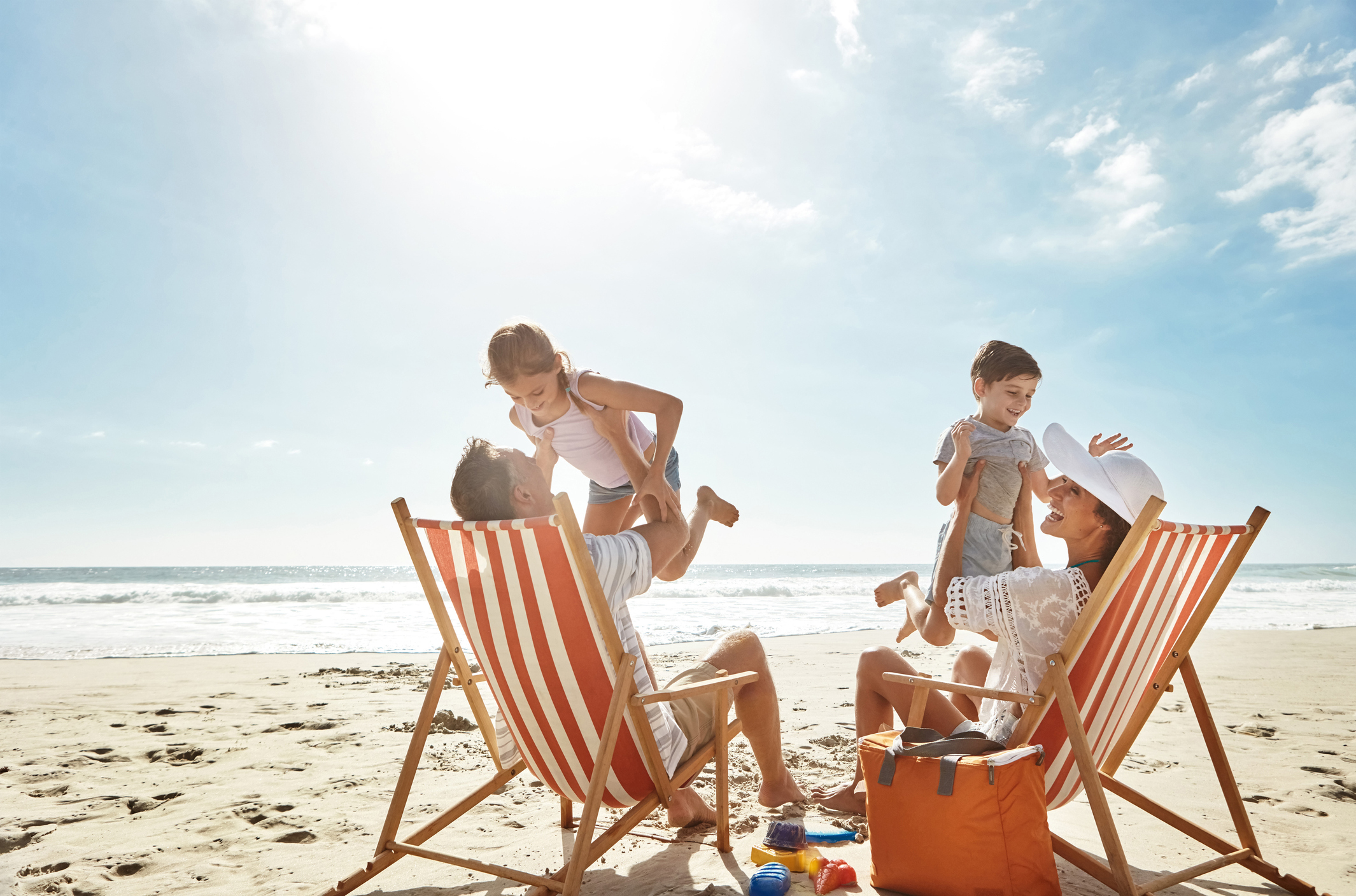 Shot of a family enjoying some quality time together at the beach.